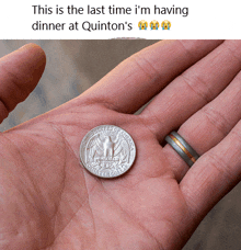 a person holding a quarter in their hand with the caption this is the last time i 'm having dinner