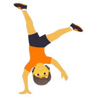 a boy in an orange shirt and black shorts is doing a handstand on a white background