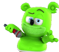 a green gummy bear is holding a microphone and pointing