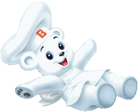 a white teddy bear wearing a chef 's hat with a letter b on it