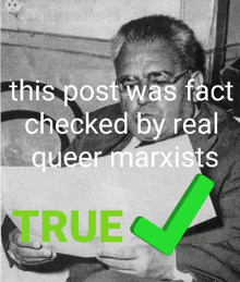 a black and white photo of a man holding a piece of paper with the caption this post was fact checked by real queer marxist