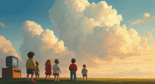 a group of children standing in a field looking at a tv