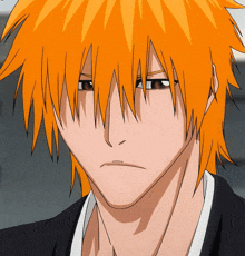 a close up of a man with orange hair