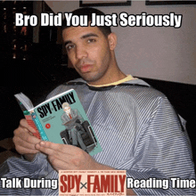 a man holding a book titled spy family