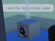 a cube with a face on it and the words i am the miss circle cube above it