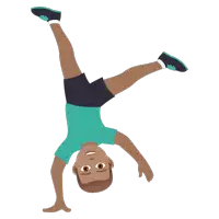 a boy in a blue shirt and black shorts does a handstand