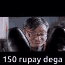 a woman wearing glasses is sitting in a car with the words `` 150 rupay dega '' .