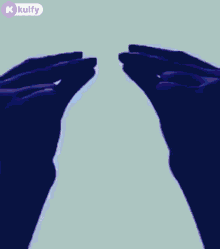 a person 's hand is reaching out towards the sky in a blurry photo .