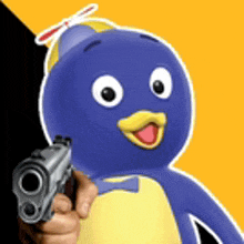 a person is holding a gun in front of a penguin with a bow tie .