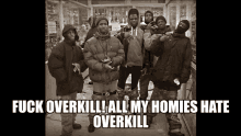 a group of young men posing for a picture with the caption " fuck overkill "