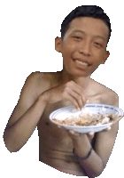 a shirtless boy is holding a plate of food