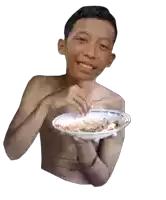 a shirtless boy is holding a plate of food