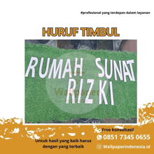 a sign that says huruf timbul rumah suntat riz ki