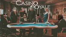 a group of people sitting around a table with the words casino royale written above them