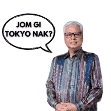 a man in a shirt with a speech bubble that says " jom gi tokyo nak "