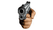 a person is holding a gun in their hand and pointing at the camera .