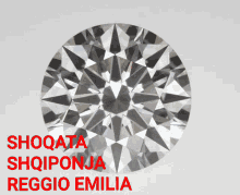 a close up of a diamond with the words shoqata sqifona reggio emilia written in red