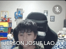 a young boy sitting in a gaming chair with the words " jerson josue lao " on the bottom right