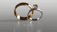 a couple of wedding rings with the date 11 07 15