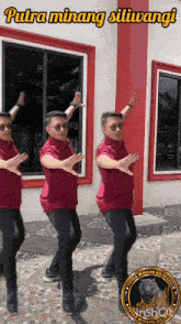 a man in a red shirt is dancing in front of a building with the words putra minang siliwangi above him