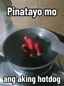 a picture of hotdogs in a frying pan with pinatayo mo ang aking hotdog