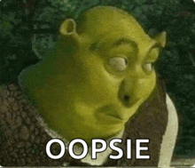 shrek from shrek is making a funny face with the words oopsie written on the bottom .