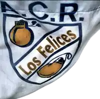 a close up of the los felices logo on a white cloth