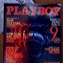 the cover of a playboy magazine with a supreme logo on it