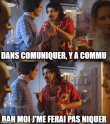 two men are talking in front of a refrigerator with the words dans communiquer y a commu