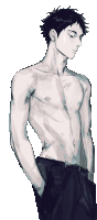 a shirtless man with his hands in his pockets