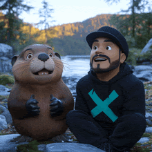 a man wearing a black hoodie with a blue x on it sits next to a beaver