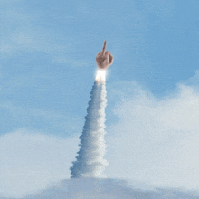 a rocket with a middle finger pointing upwards