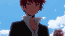 a boy with red hair is standing in front of a blue sky holding a cell phone .