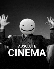 a man in a suit has a smiley face on his head and the words absolute cinema below him