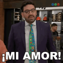 a man in a suit and tie says mi amor in spanish