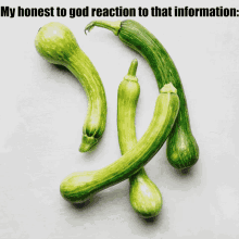 a bunch of green zucchini with the words " my honest to god reaction to that information " below them