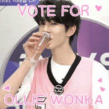 a boy drinking from a glass with the words vote for ollie wonka written on the bottom