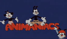 a group of cartoon characters are standing in front of the word animaniacs