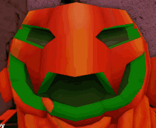 an orange pumpkin with a green mouth and a smiley face on it