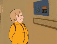 a cartoon of a boy in a yellow jacket standing in front of a wall with a red button that says " ii "