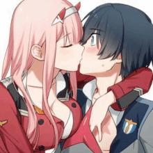 a man and a woman are kissing each other in a anime .