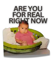 a baby is sitting in a green laundry basket with the words " are you for real right now " above it