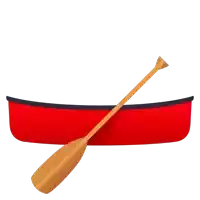 a red canoe with a wooden paddle attached