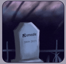 a gravestone with omegle 2009-2023 on it