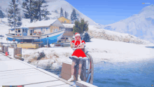 a woman in a santa costume is standing on a dock near the water