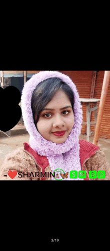 a woman wearing a purple hooded scarf with sharmin written on the bottom right