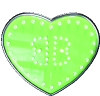 a green heart with rhinestones on it that says g