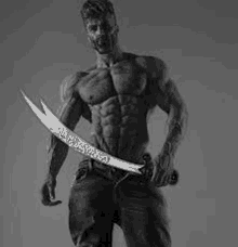 a muscular man is holding a sword in his hand in a black and white photo .