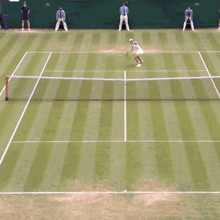 a woman in a white dress stands on a tennis court in front of a scoreboard that reads 101 mph