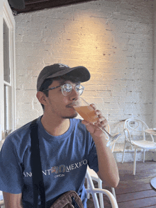 a man wearing a shirt that says mexico on it